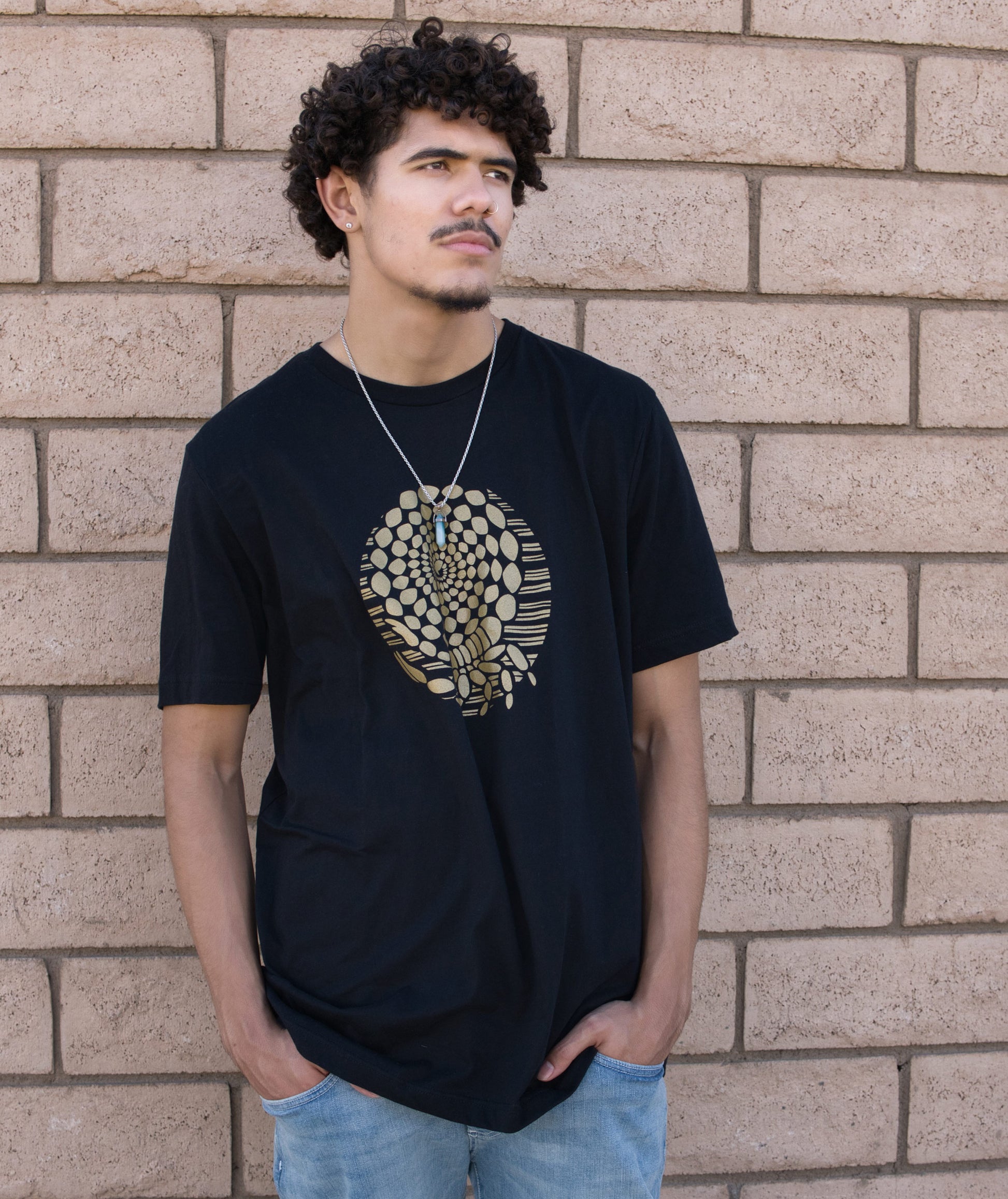 Desert Gold Scorpion T-shirt in Black Modeled by Andrew Clark