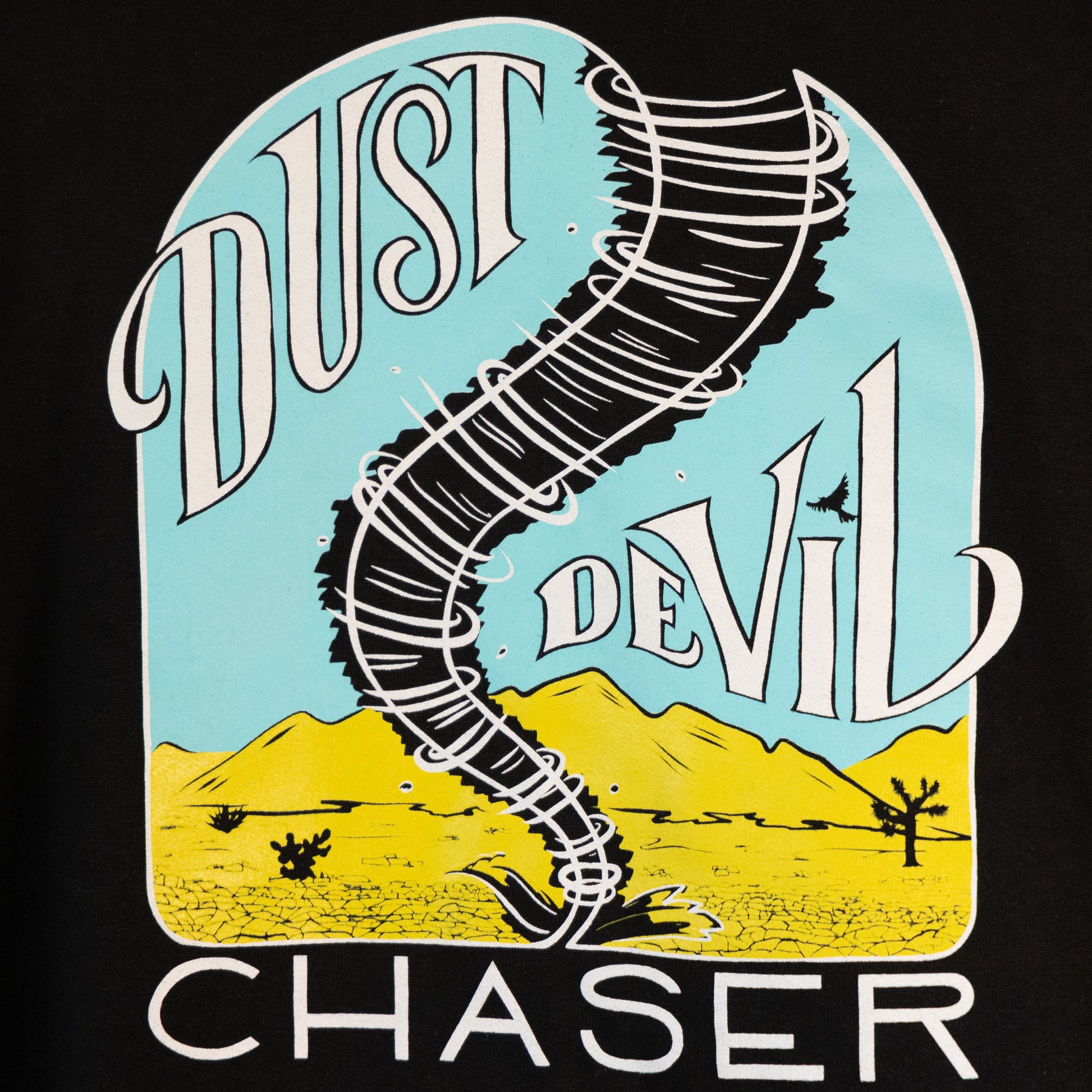 A close up of the design. The gender neutral hooded black colored sweatshirt has a white, bright blue, and yellow dust devil illustration in the center. The words "Dust Devil Chaser" are written in a white handwritten font within and below the design.