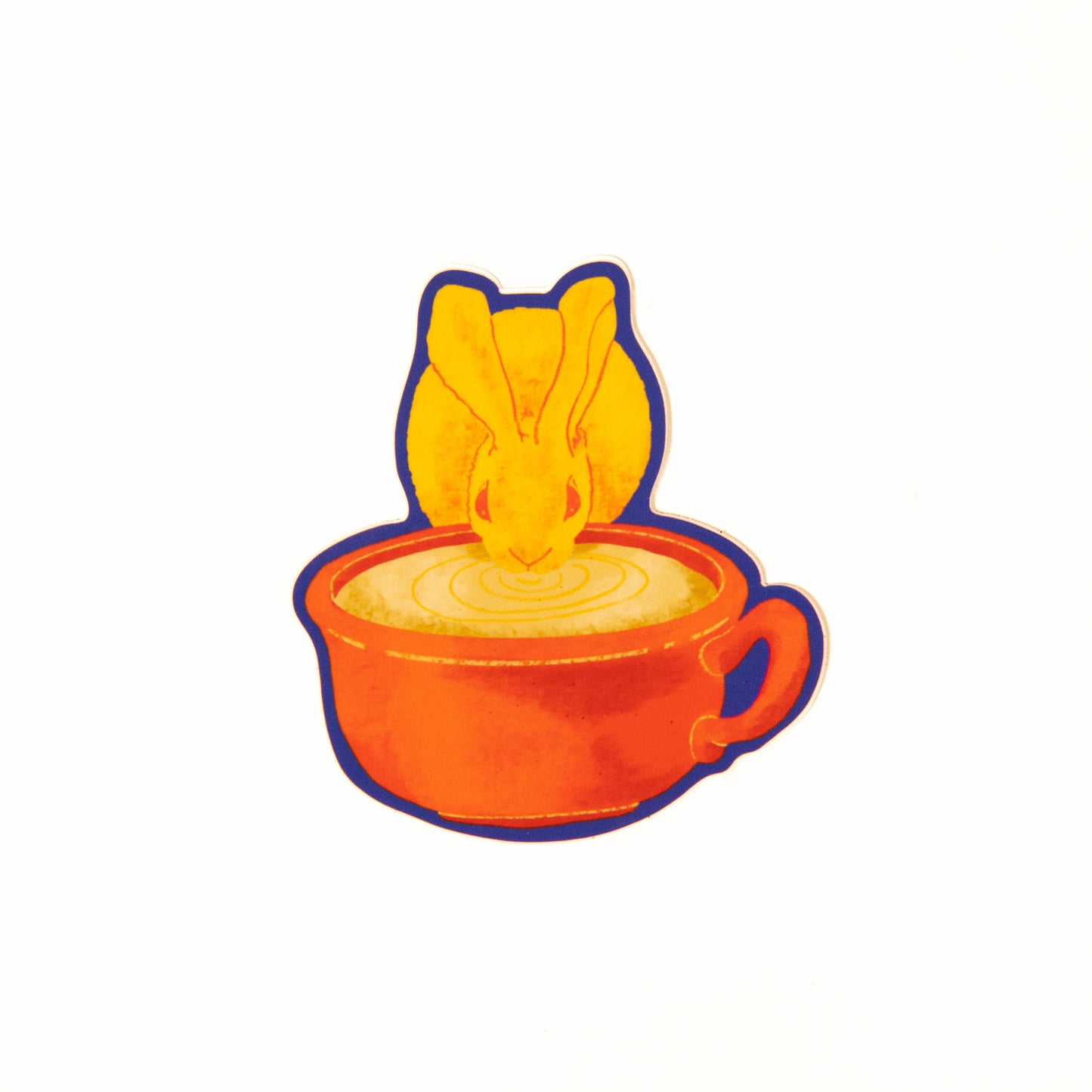 An illustrated drawing called Fika Bunny as a sticker. The illustration shows a yellow furred Desert Cottontail Rabbit taking a sip out of a large mug of coffee. The coffee mug is red in color and has a handle on the right side. The border of the sticker is a bright blue.