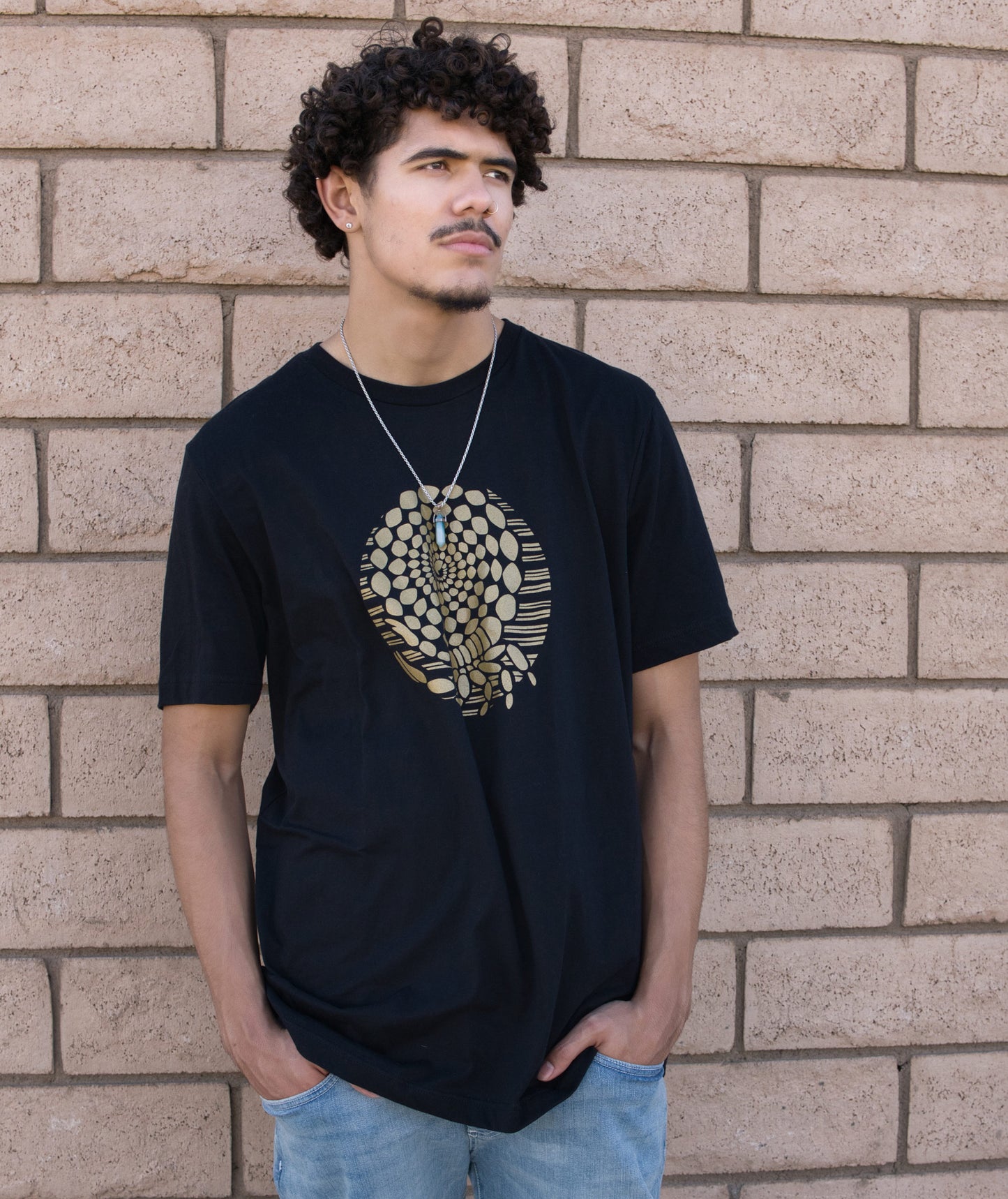 Desert Gold Scorpion T-shirt in Black Modeled by Andrew Clark